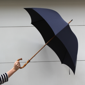 Exclusively handmade umbrellas made in England for Frederick Lynn. These magnificent umbrellas are made from one solid piece of wood with a hand bent crook providing additional stability, longevity and a unique look.
